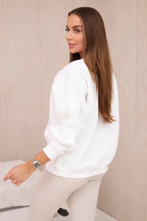 Bluza ocieplana ze ściągaczem i ozdobnymi kokardami ecru Bluza ocieplana ze ściągaczem i ozdobnymi kokardami ecru